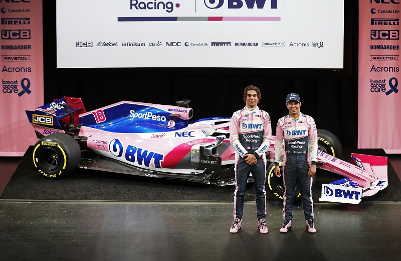 1552354448851555.jpg Lance Stroll and Sergio Perez at the unveiling of SportPesa Racing Point F1 car in Toronto.jpg
